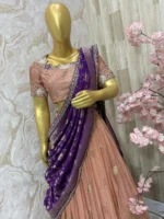 Tissue lehenga with beautiful pattu border paired up with maggam work blouse & rich dupatta