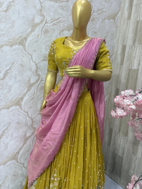 Bridal heavy hand work lehenga paired with beautiful contrast hand work dupatta