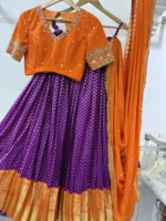 Designer lehenga with pattu border paired with beautiful maggam work blouse & contrast dupatta