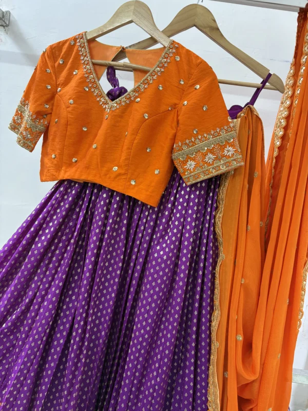 Designer lehenga with pattu border paired with beautiful maggam work blouse & contrast dupatta
