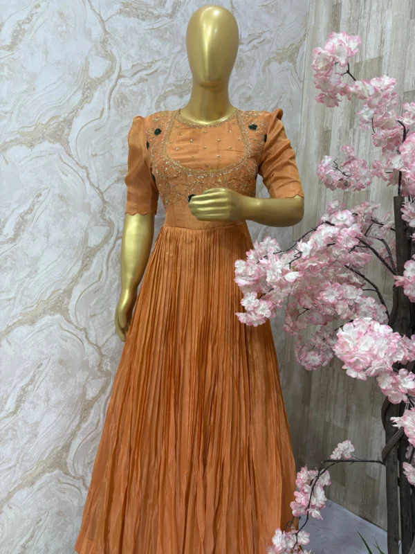 Tissue long gown having beautiful maggam work on yoke part