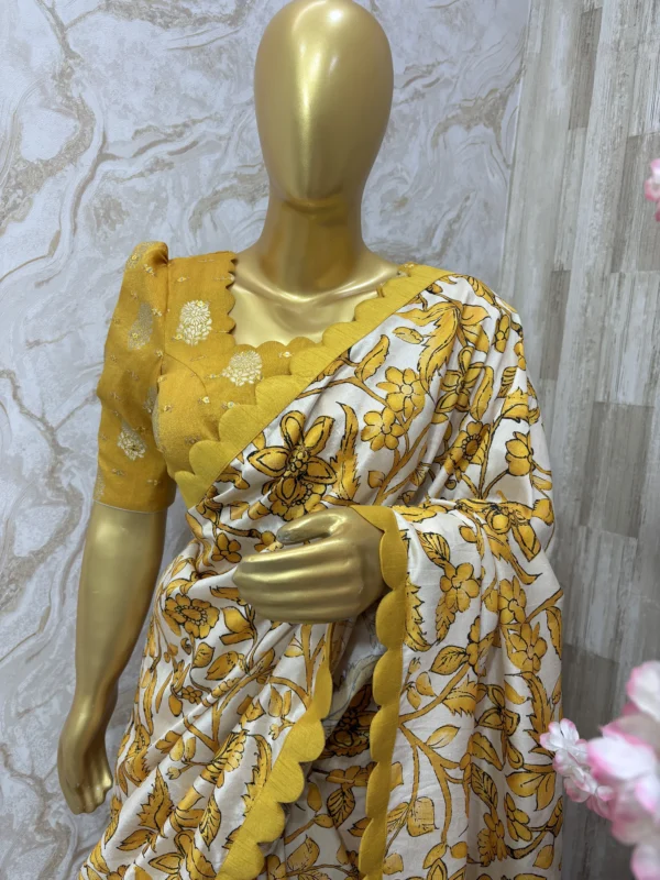 Kalamkari saree having scalap border paired with beautiful tissue sequin work blouse