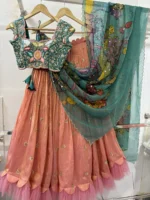 Tissue lehenga paired up with heavy maggam work blouse & pure pen kalamkari organza dupatta