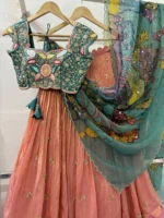 Tissue lehenga paired up with heavy maggam work blouse & pure pen kalamkari organza dupatta