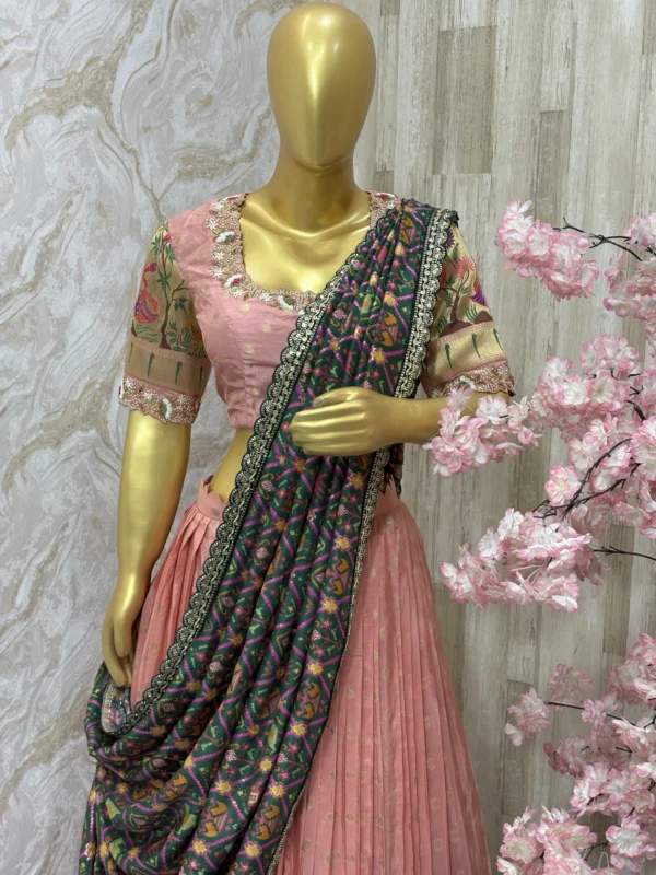 Pure munga crepe lehenga having beautiful pithani border pired with maggam work blouse & patola dupatta