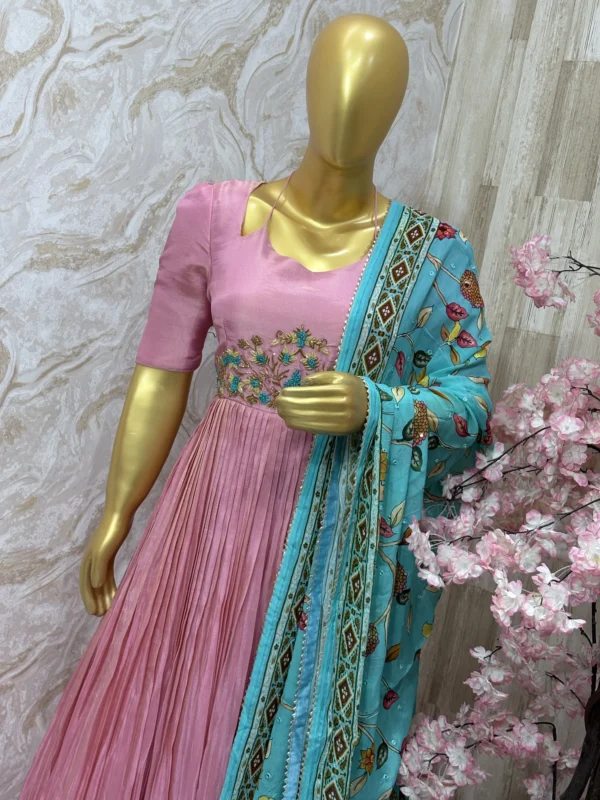 Tissue long gown with beautiful maggam work & having heavy flare paired with chiffon kalamkari dupatta