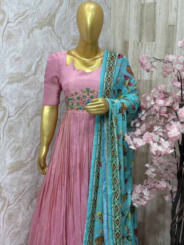 Tissue long gown with beautiful maggam work & having heavy flare paired with chiffon kalamkari dupatta