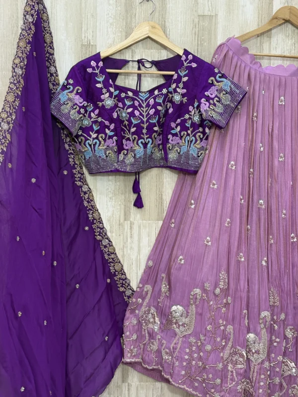 Bridal lehenga with heavy maggam work blouse paired with hand work dupatta