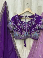 Bridal lehenga with heavy maggam work blouse paired with hand work dupatta