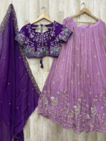 Bridal lehenga with heavy maggam work blouse paired with hand work dupatta