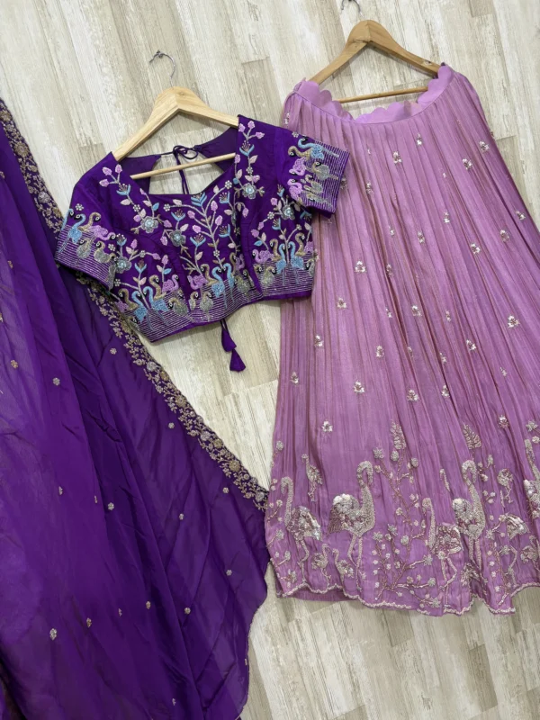 Bridal lehenga with heavy maggam work blouse paired with hand work dupatta