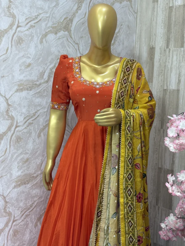 Designer crepe silk long gown with beautiful maggam work paired with kalamkari mirror work dupatta