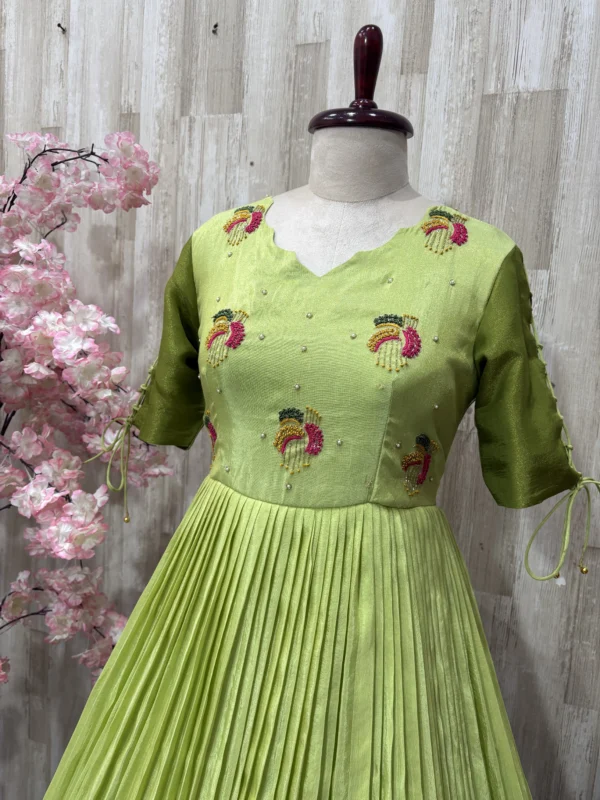 Dual shade maggam work long gown with heavy flare