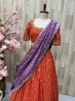 Trending orange lehenga paired with beautiful maggam work & patola silk dupatta