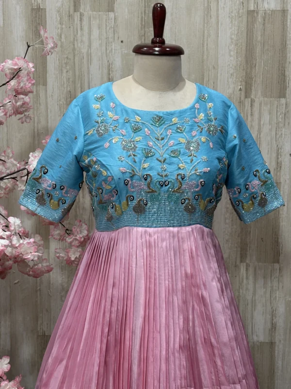 Dual shade heavy maggam work long gown with heavy flare