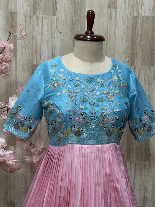 Dual shade heavy maggam work long gown with heavy flare