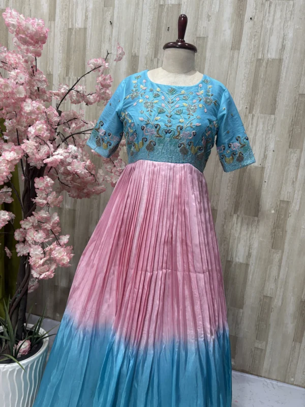 Dual shade heavy maggam work long gown with heavy flare