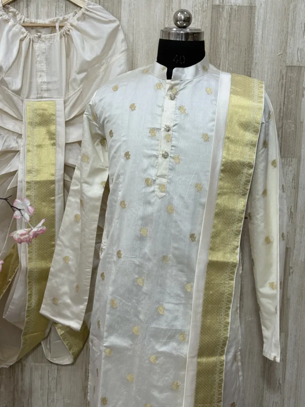 Pure chiniya pattu kurta paired with pure pattu dhoti & kanduva
