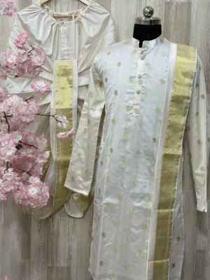 Pure chiniya pattu kurta paired with pure pattu dhoti & kanduva
