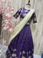 Applique work lehenga blouse paired with beautiful hand work tissue dupatta