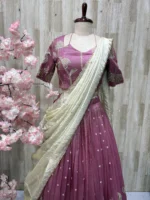 Applique work lehenga paired with beautiful hand work tissue dupatta