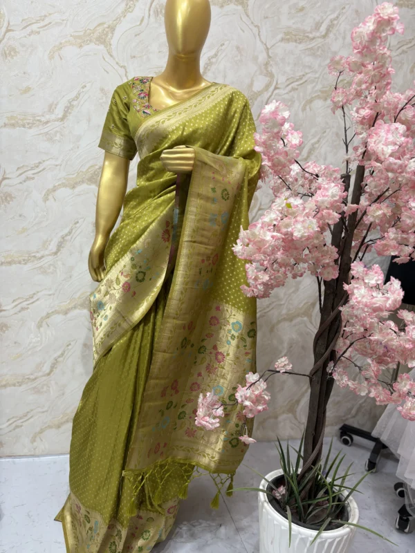 Soft banaras silk saree with pithani border paired with maggam work blouse