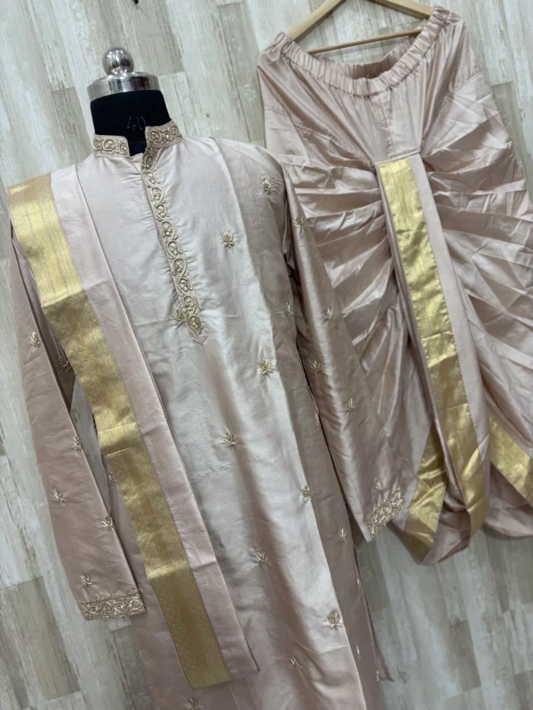 Pure pattu men's kurta with beautiful maggam work paired with matching dhoti & kanduva