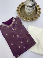 Tissue men's kurta having all over sequin bootis and maggam work on collar paired with cream colour pijama