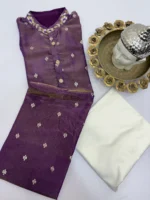 Tissue men's kurta having all over sequin bootis and maggam work on collar paired with cream colour pijama