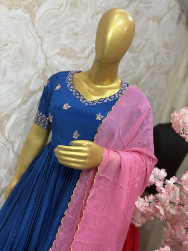 Pure crepe long gown with maggam work on yoke part paired with chinnon dupatta with scalap edges