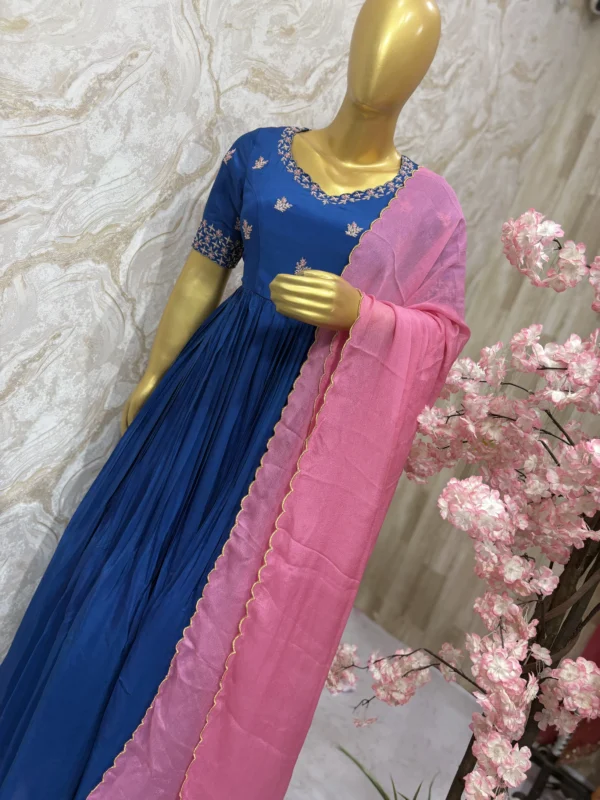 Pure crepe long gown with maggam work on yoke part paired with chinnon dupatta with scalap edges