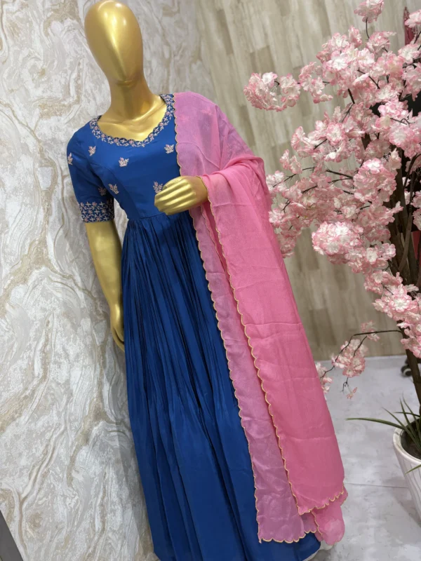 Pure crepe long gown with maggam work on yoke part paired with chinnon dupatta with scalap edges