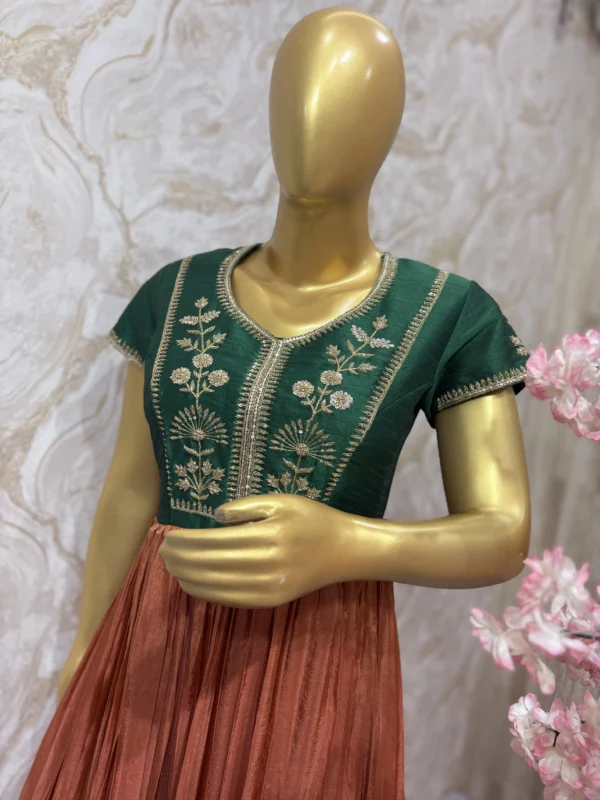 Tissue long gown with pretty maggam work yoke