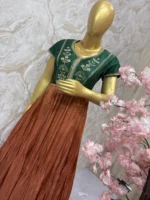 Tissue long gown with pretty maggam work yoke