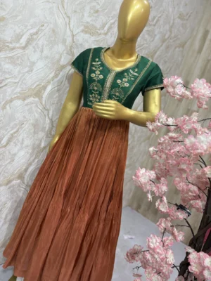 Tissue long gown with pretty maggam work yoke