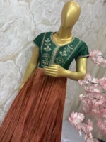 Tissue long gown with pretty maggam work yoke