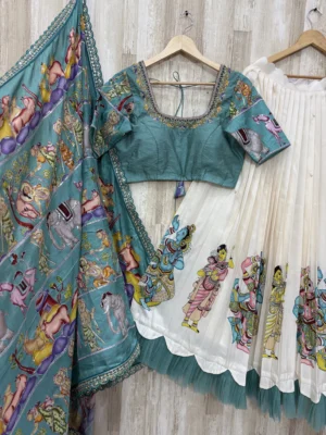 Kalamkari hand work lehenga paired with beautiful maggam work blouse & kalamkari dupatta