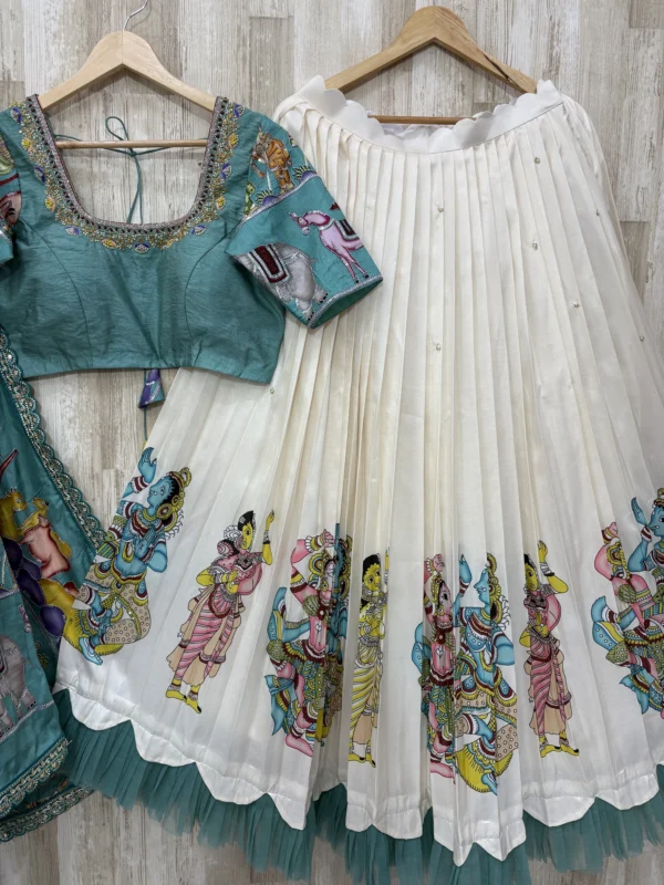 Kalamkari hand work lehenga paired with beautiful maggam work blouse & kalamkari dupatta