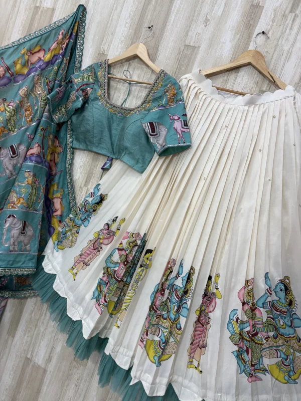 Kalamkari hand work lehenga paired with beautiful maggam work blouse & kalamkari dupatta