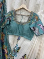 Kalamkari hand work lehenga paired with beautiful maggam work blouse & kalamkari dupatta