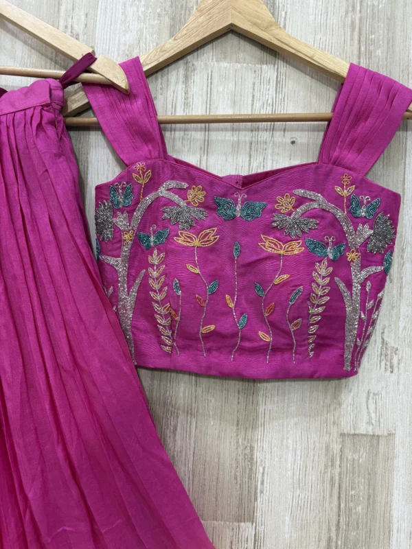 Dual shade skirt paired with pretty maggam work blouse