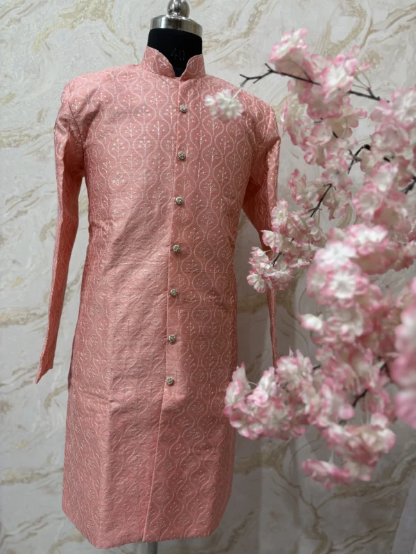 Rawsilk sequin & embroidery work kurta paired with cream colour pijama