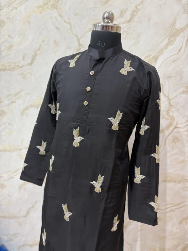 Designer men's kurta with pretty maggam work paired with cream colour pijama