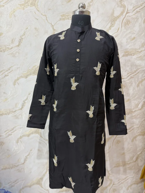 Designer men's kurta with pretty maggam work paired with cream colour pijama