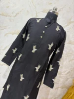 Designer men's kurta with pretty maggam work paired with cream colour pijama
