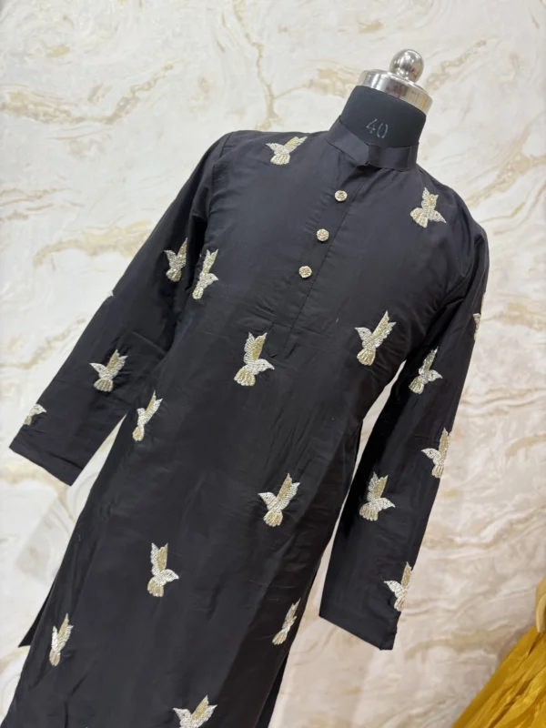 Designer men's kurta with pretty maggam work paired with cream colour pijama