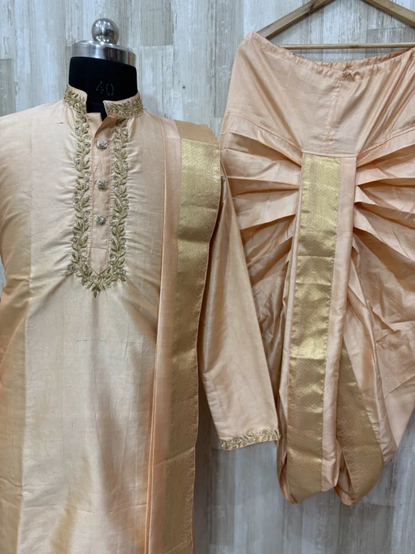 Pure pattu dhoti set with beautiful maggam work