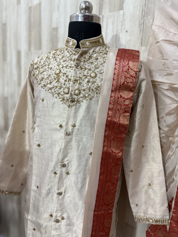 Pure tissue pattu dhoti set with heavy maggam work