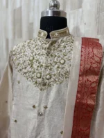 Pure tissue pattu dhoti set with heavy maggam work