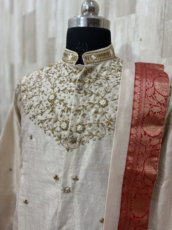 Pure tissue pattu dhoti set with heavy maggam work